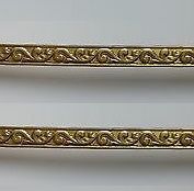 Moldura de latón